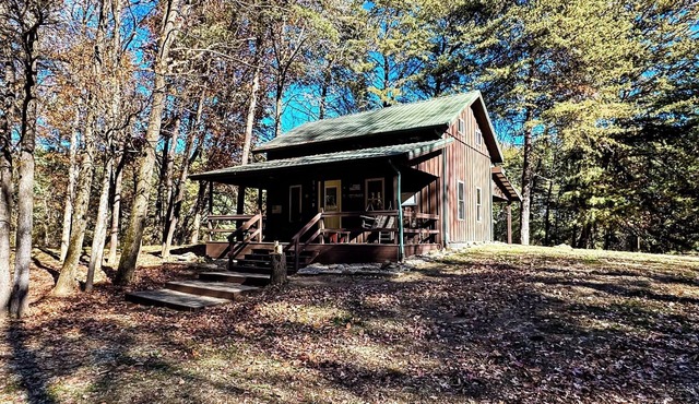 Pine Oaks Cabin includes Guest Pole Barn. Modern comfort meets county living.