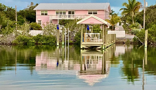 Pink Bikini Island Cottage with a dock on Black Sound