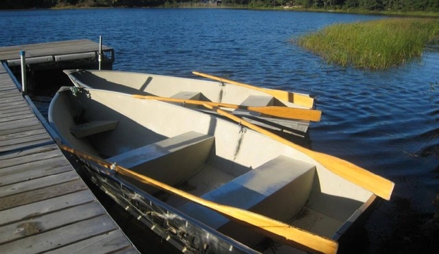 Pond front with private beach rights, dock, rowboats and swim platform.