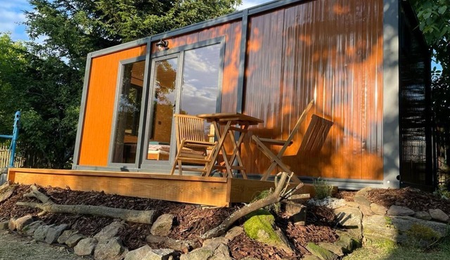 Pond view tiny house with big patio and breakfast, rural