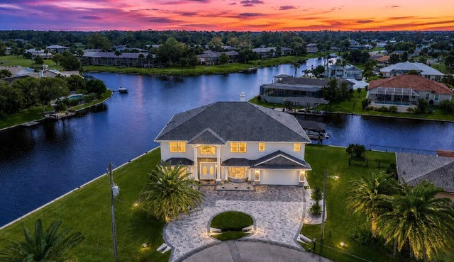 Pool and canal front home in Palm Coast!