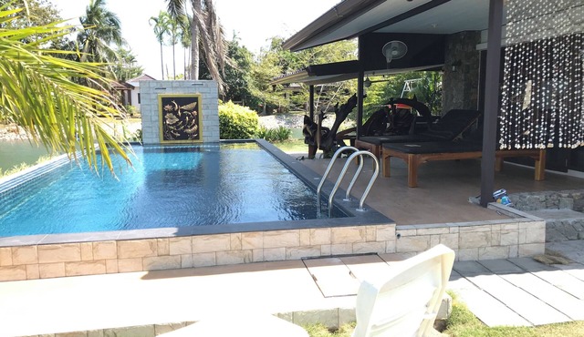 Pool villa with 3 bedrooms 7 can sleep by a river 100m to the beach