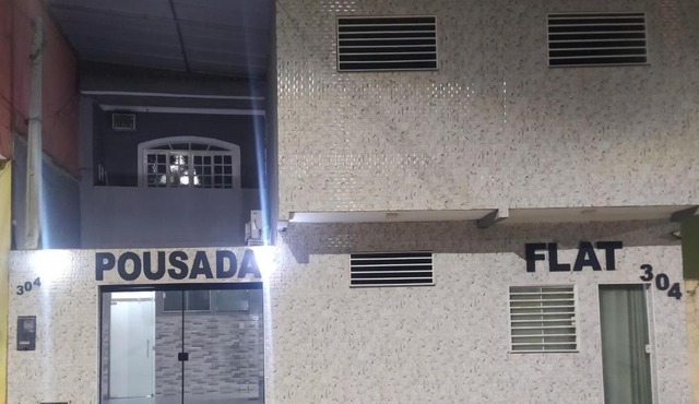 Pousada Quarto com tv,ar,frigobar,wifi e garagem
