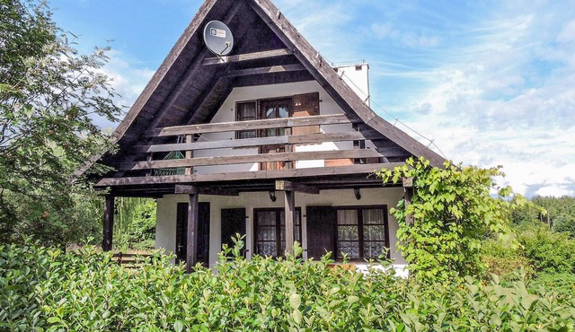 Practically furnished vacation home with private garden in idyllic surroundings near Lake Symsar.