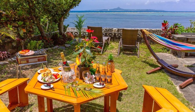 Private accommodation along the beach BBQ while looking at the sea Inside the Fukugi trees in Bise/Kunigami-gun Okinawa