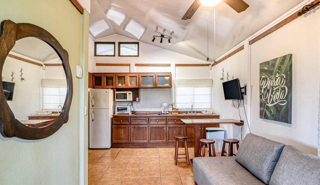 Private cabin, surrounded by gardens and trees, with a shared pool!