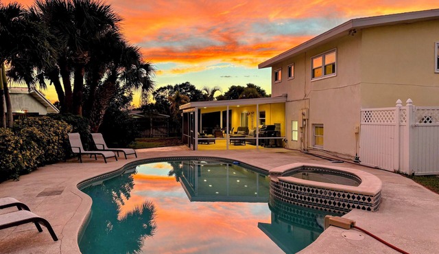 Private heated pool home with hot tub near beach, sleeps 10