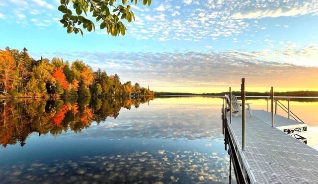 Private Lakefront Stay with Beautiful Sunset Views, Kayaks, & Kid’s Area