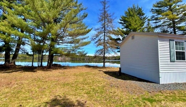 Private, Peaceful, lakefront, fully furnished 2-bedroom Mini-home .
