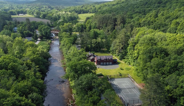 Private river-front home with tennis court and hot tub in the Berkshire hills!