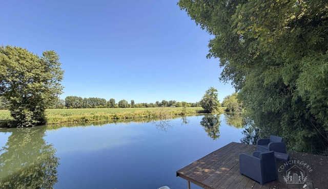 Private riverside villa with garden sleeps 8