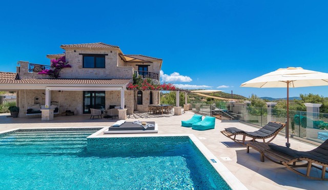 Private stone villa with heated pool & large outside area, set atop on hillside