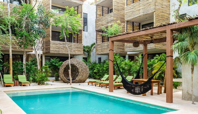 Private Terraces, Full Kitchen, 2 Pools & Parking!