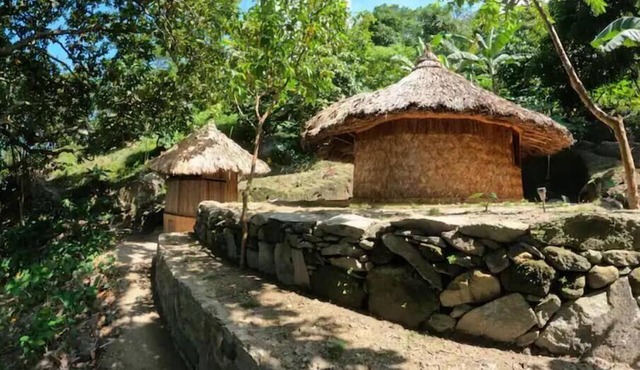 Private waterfall and indigenous house!