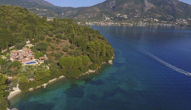 Private waterfront villa with pool and two private beaches