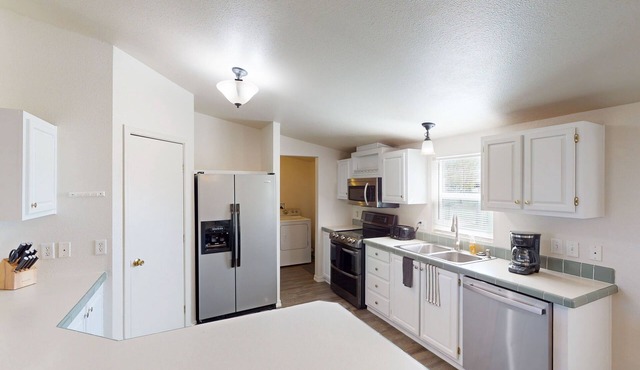 Quaint home with firepit, gas grill, WiFi, dog-friendly