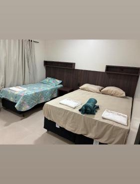 Quarto 2 com ar-condicionado e Wi Fi em Cuiabá