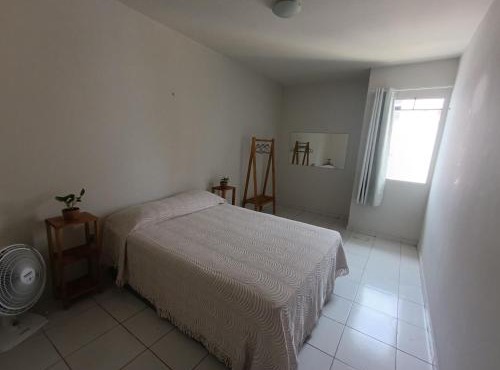 Quarto com banheiro privativo perto da praia
