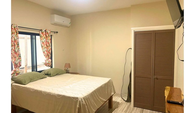 Quiet and stylish suite with a queen bed and ensuite bathroom. Designed for peaceful rest and inspired productivity.