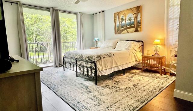 Quite Cozy 2-bedroom condo on the 5th hole with AC in charming Pompano Beach.