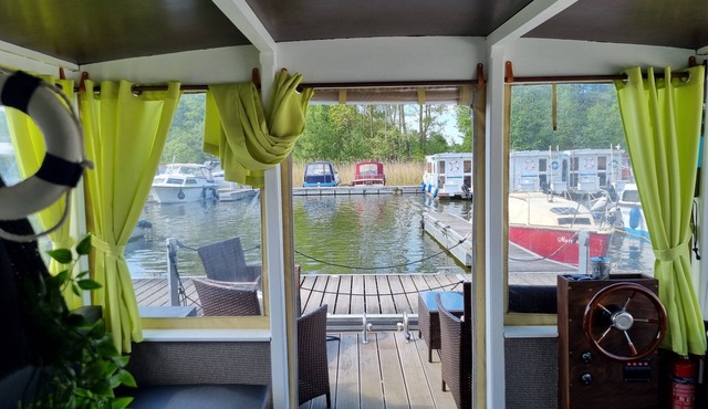 Raft 'Priepert 2' on the Mecklenburg Lake District with Covered Terrace