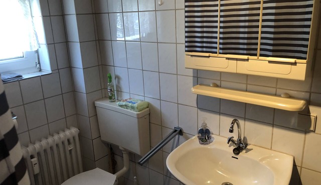 Ramstein Room with private bathroom, shared kitchen and living room/balcony