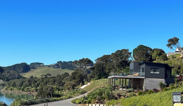 Rangitahi paradise. A modern 4 bedroom home overlooking the estuary in Raglan.