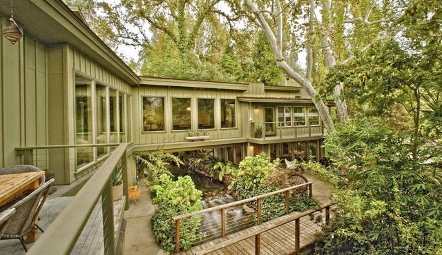 Ready to escape the city? Waterfall retreat home w/river running through it!
