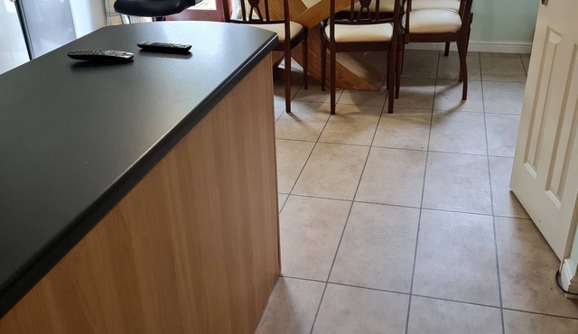 Reasonably large room with luxurious bathroom and a fitted kitchen