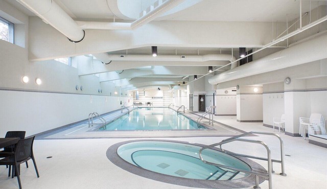 Recently Renovated 10m Walk BC PLACE 2.5bdrm Condo w Parking, Pool, Sauna + A/C