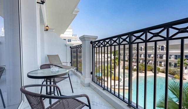 Refined 1BR Escape with Pool-Facing Views, Near to Dubai Butterfly Garden,