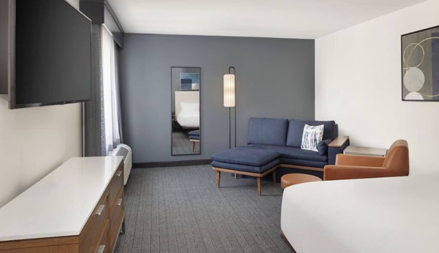 Relax in Modern Room with 1 King Bed, Free Parking, Easy Highway Access