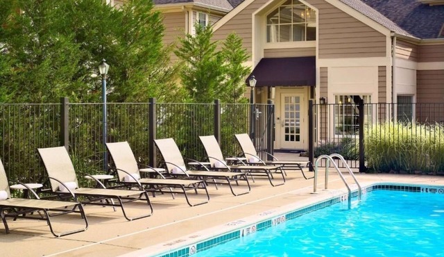 Relax in Spacious Suite with Full Kitchen and Seasonal Swimming Pool
