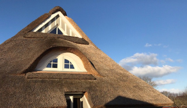 relaxation comes under thatch......with a sauna