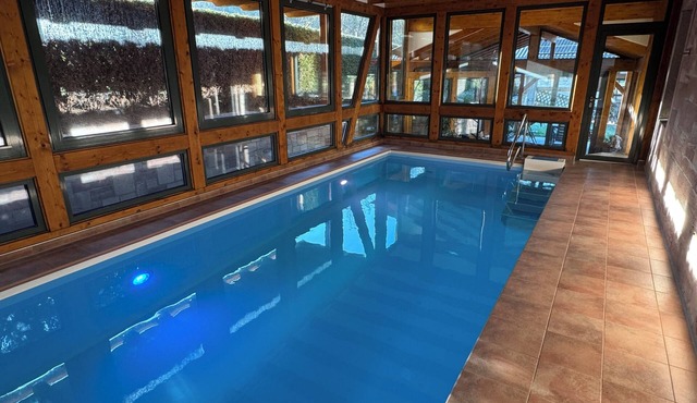 Relaxation in the forest - with swimming pool!
