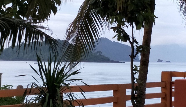 Relaxing beach side condo with mountain and island views.