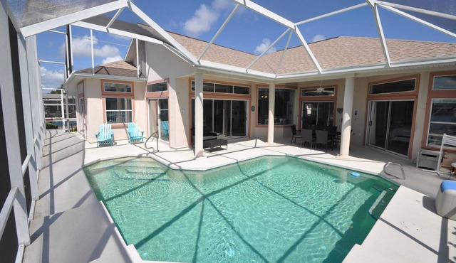 Relaxing Canalfront Home with Pool & Sunset Views