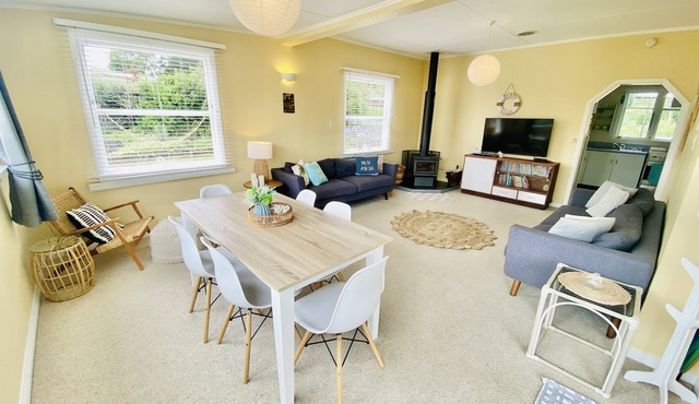 Relaxing cosy 1950's family beach house 1 block back from the beautiful beach.