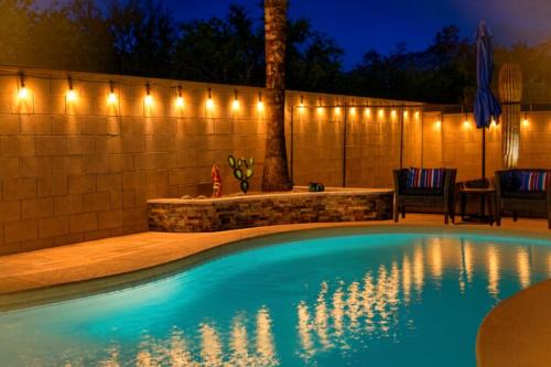 Relaxing Summer Nights at Casa Buena Vida Pool Fire Pit Table Games