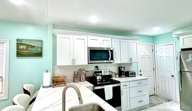 Renovated Water front home near the highway. Access to Lake&beach available