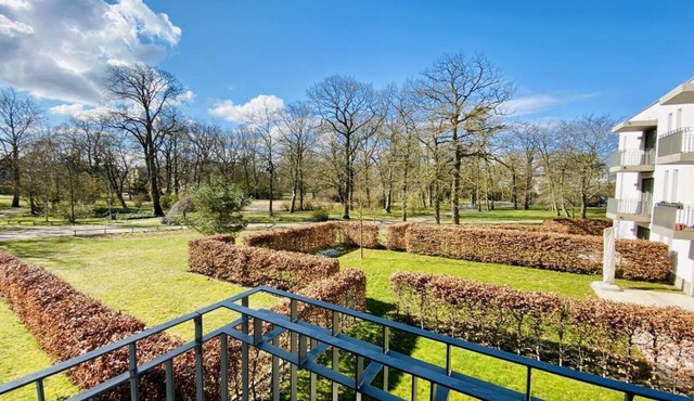 Residence in the spa gardens, park view