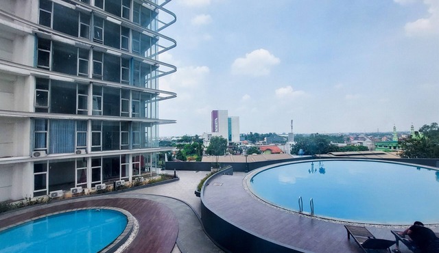 Restful And Modern 2Br Majestic Point Serpong Apartment