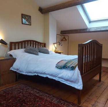 Restful attic room in riverside spot