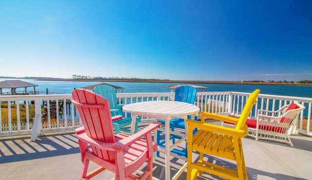 Restored Beach Cottage on the back river with private covered floating gazebo and dock.