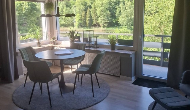 River view! modern vacation apartment with balcony, at the cycle path Fulda+Weser
