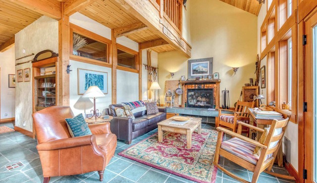Riverfront home close to skiing & fishing with beach access & huge VHS library