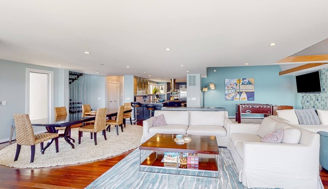 Riverfront home with private dock, foosball table, fireplace, river views