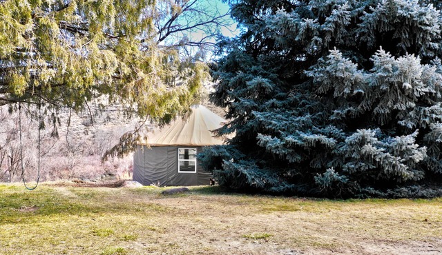 Riverfront Yurt w/Hot Tub Near Hot Springs, Hiking & Kayaking