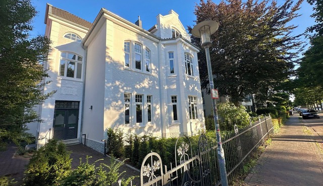 Riverside residence: old building charm, comfort & water views