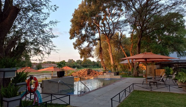 Riverside Splash- Stylish and Cozy Cottages by the River bank